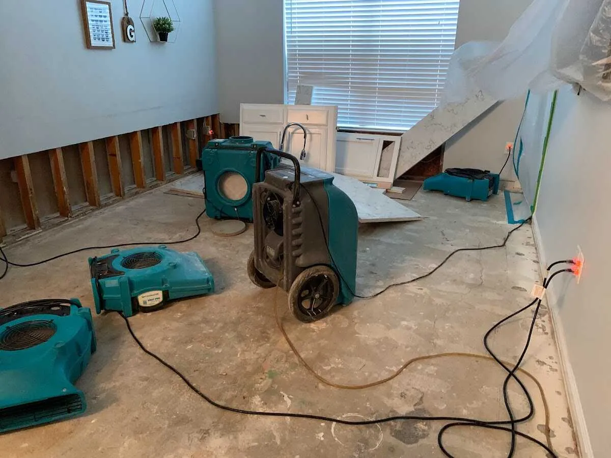Dehumidifier in flood-cut room for Water Damage Restoration in Cedarhurst